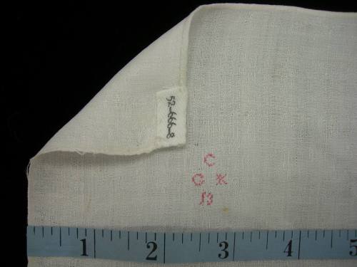 2009 Record shot by L. Baumgarten. Napkin, detail of mark.