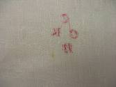 2009 Record shot by L. Baumgarten. Napkin, detail of reverse of mark.