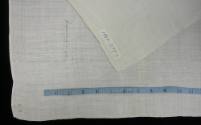 2009 Record shot by L. Baumgarten. Napkin, detail to show marks.