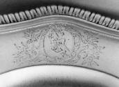 C70-622. Plate, detail of arms.