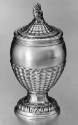 C74-343. Tea canister
