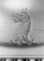 C74-377. Candlestick, crest of griffon's head erased. 
