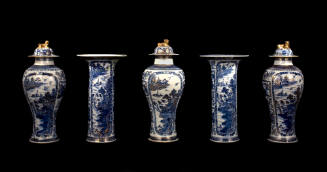 D2010-CMD-008. Garniture, black background.