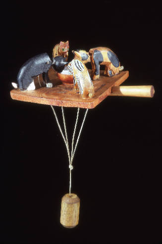 Feeding cats weighted toy