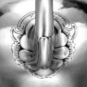 D2010-CMD-056. Teapot, engraving around spout.
