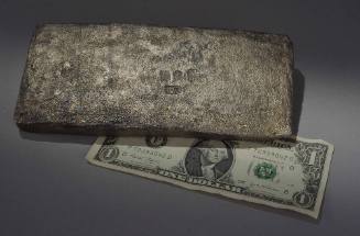 Tumbaga with dollar bill for scale 2008-46