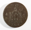 2010-121, Coin